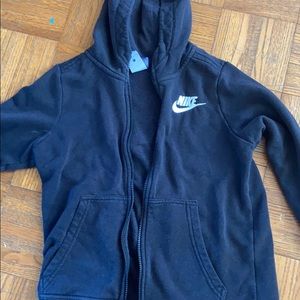 Worn Nike black jacket